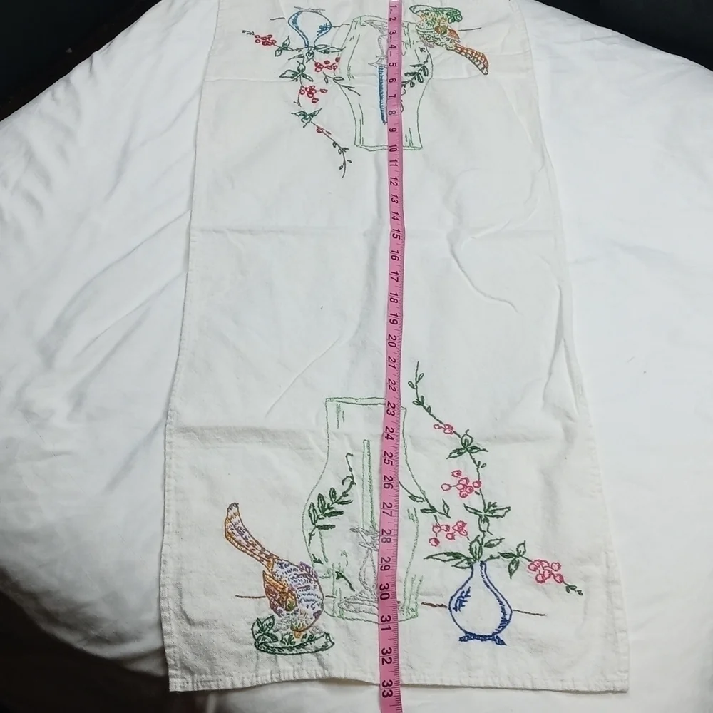 None embroidered table